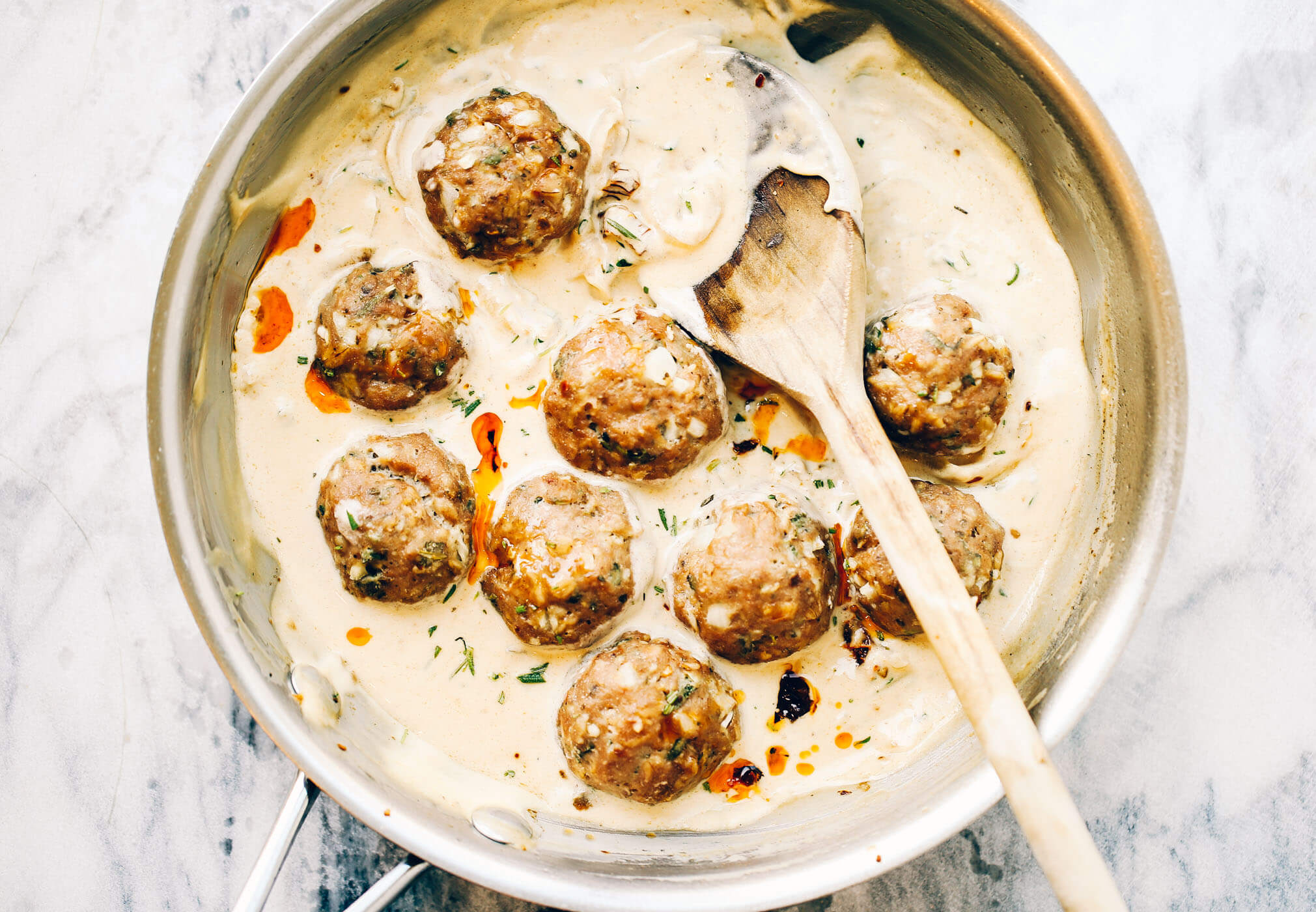 Unbelievably easy Oven Baked Paleo TURKEY MEATBALLS AND SAGE CREAM SAUCE (Gluten free, whole30, paleo). Perfect for a weeknight dinner or breakfast! On the table in LESS than 25 minutes! Paleo turkey meatballs. Whole30 breakfast recipes. Easy whole30 breakfast ideas. Whole30 families meatballs. Ground turkey whole30 meatballs. Easy whole30 recipes. Whole30 meal planning. Easy whole30 dinner recipes. Whole30 shopping list.